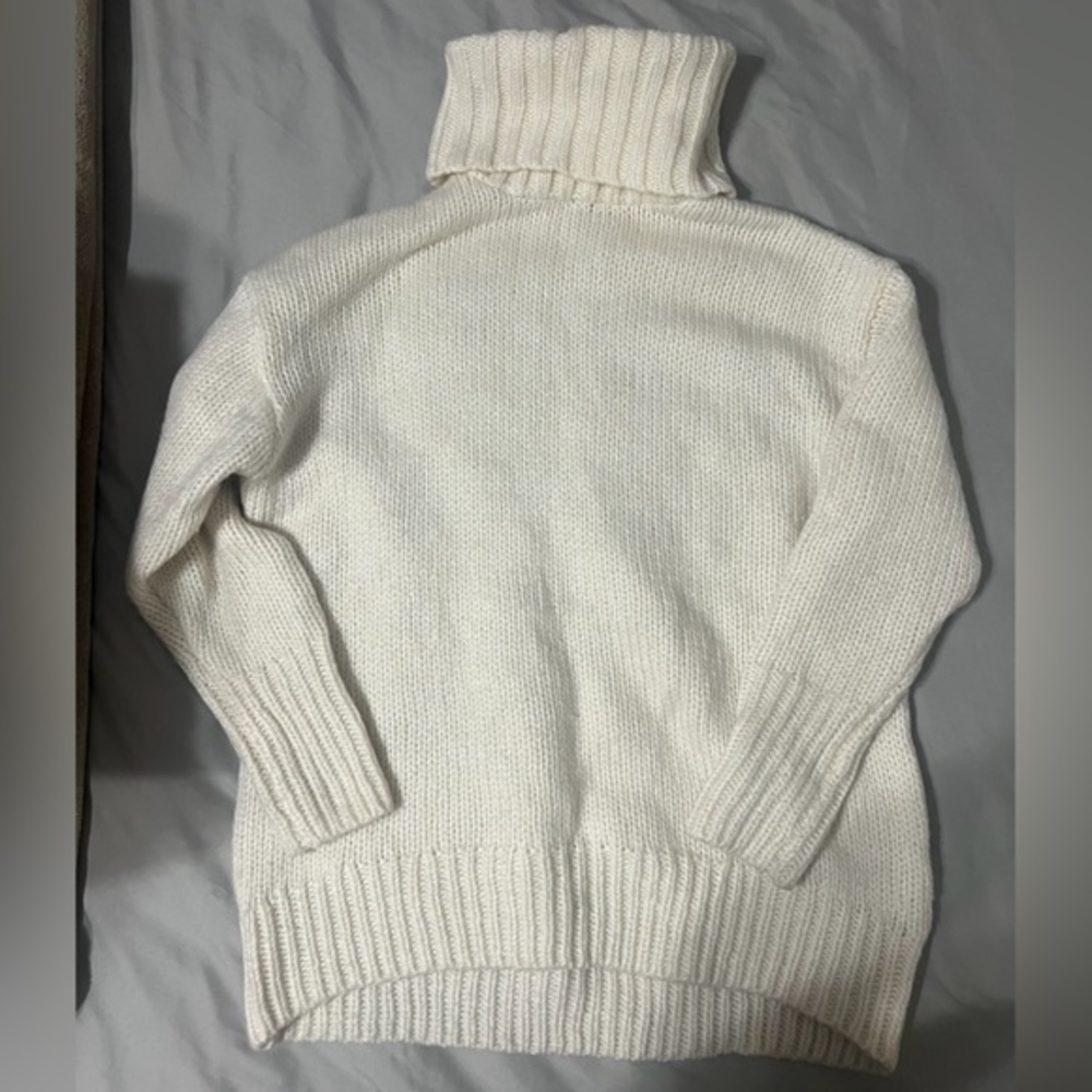 Chunky oversized turtleneck cable knit sweater